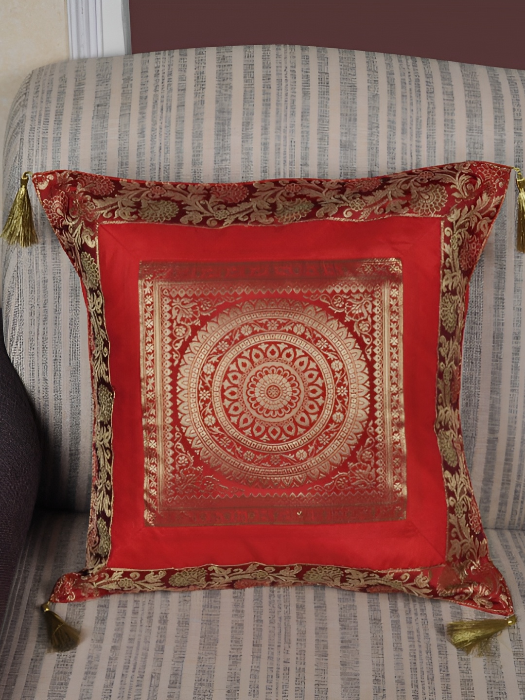

Lal Haveli Red & Gold Toned Ethnic Motifs Square Cushion Cover