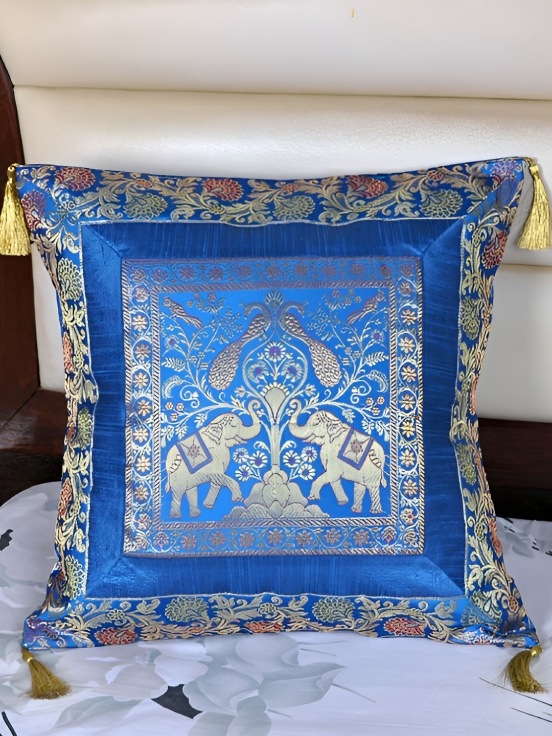 

Lal Haveli Turquoise Blue Ethnic Motifs Silk Square Cushion Cover