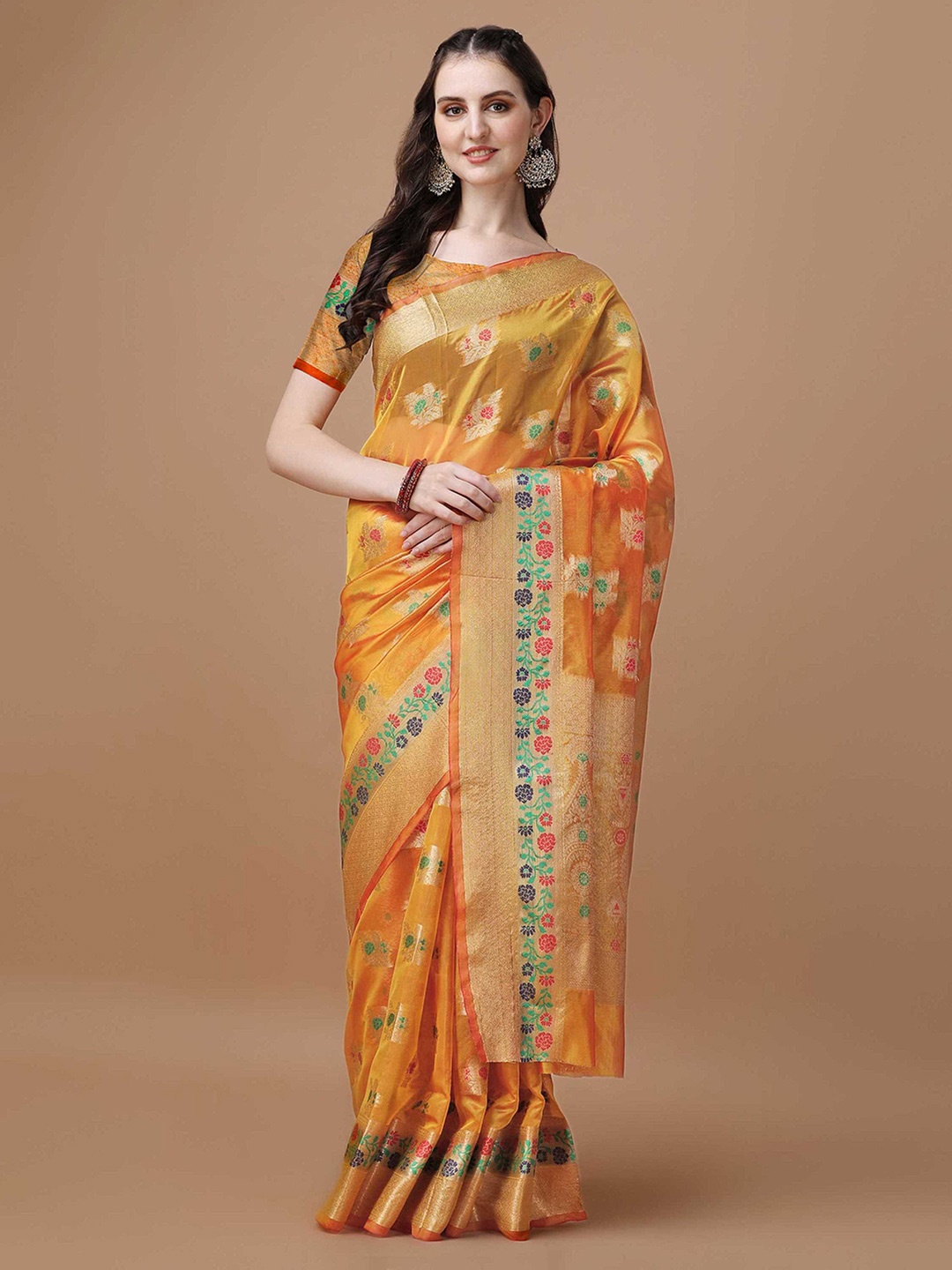 

Mitera Orange Ethnic Motifs Woven Design Zari Organza Saree
