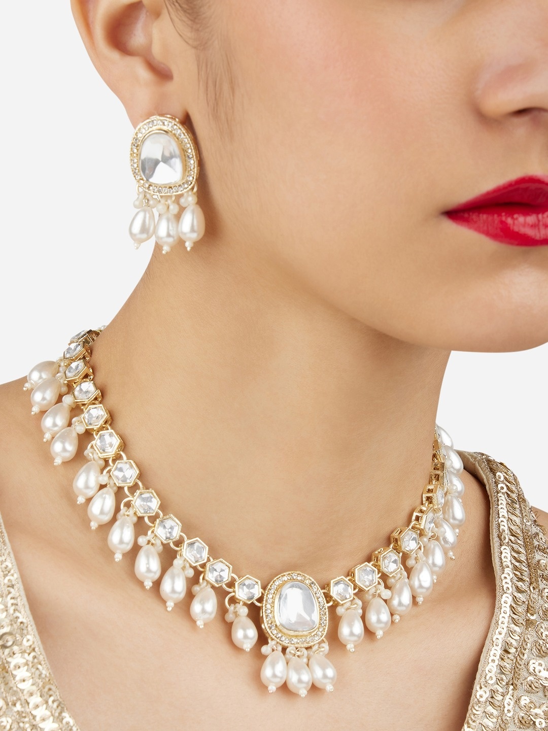 

Zaveri Pearls Gold-Plated Stone Studded & Beads Beaded Necklace With Earrings