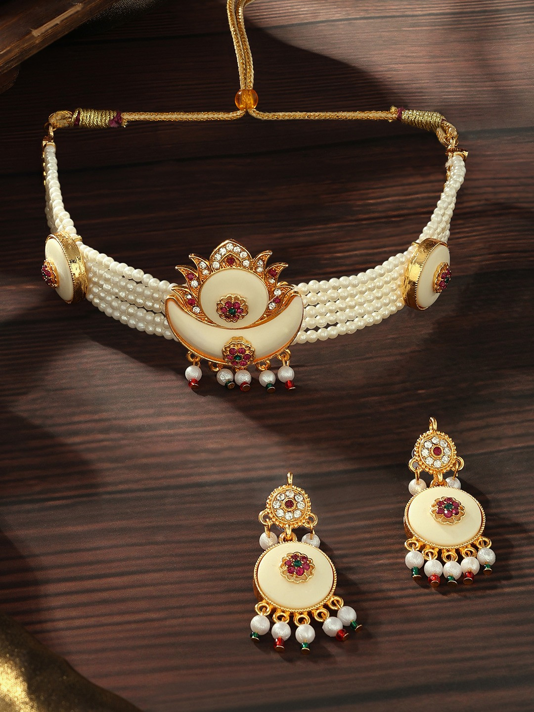 

Zaveri Pearls Gold-Plated Stone Studded & Beaded Jewellery Set