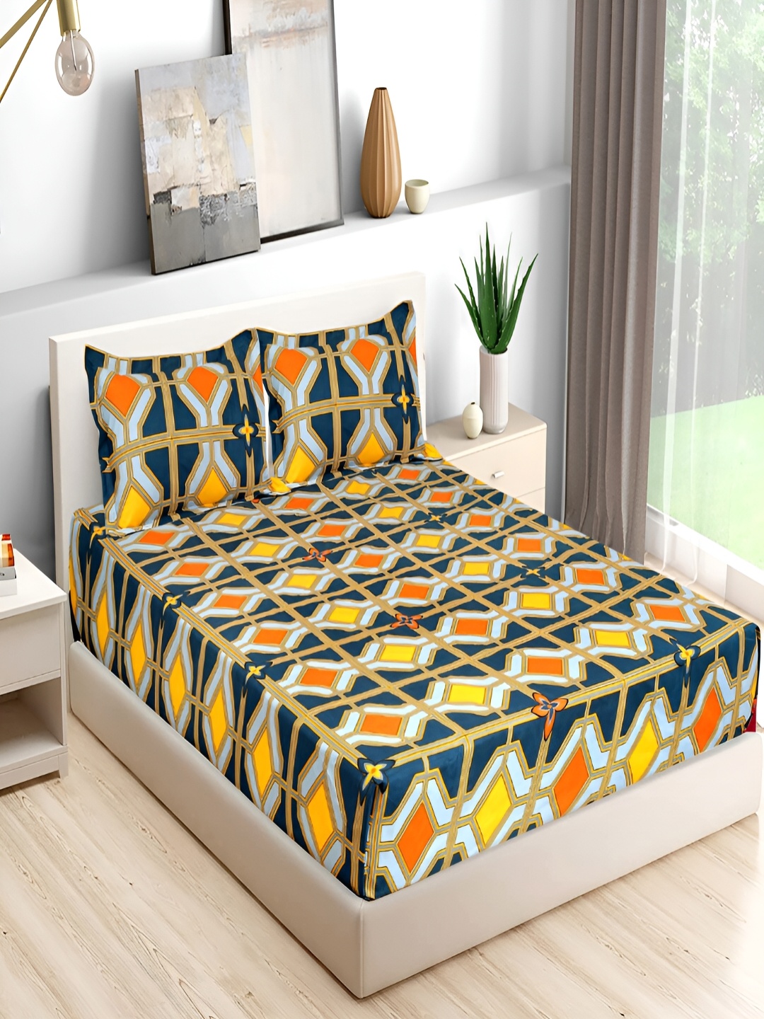 

Bromwick Blue & Orange Geometric Cotton 210 TC Queen Bedsheet With 2 Pillow Covers
