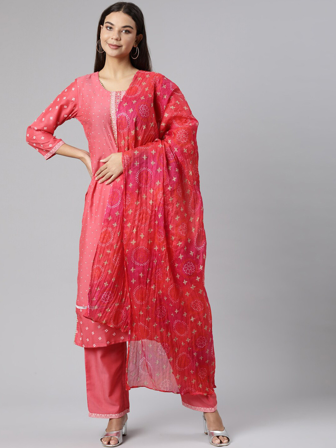

Neerus Bandhani Printed Mirror Work Kurta with Trousers & Dupatta, Red