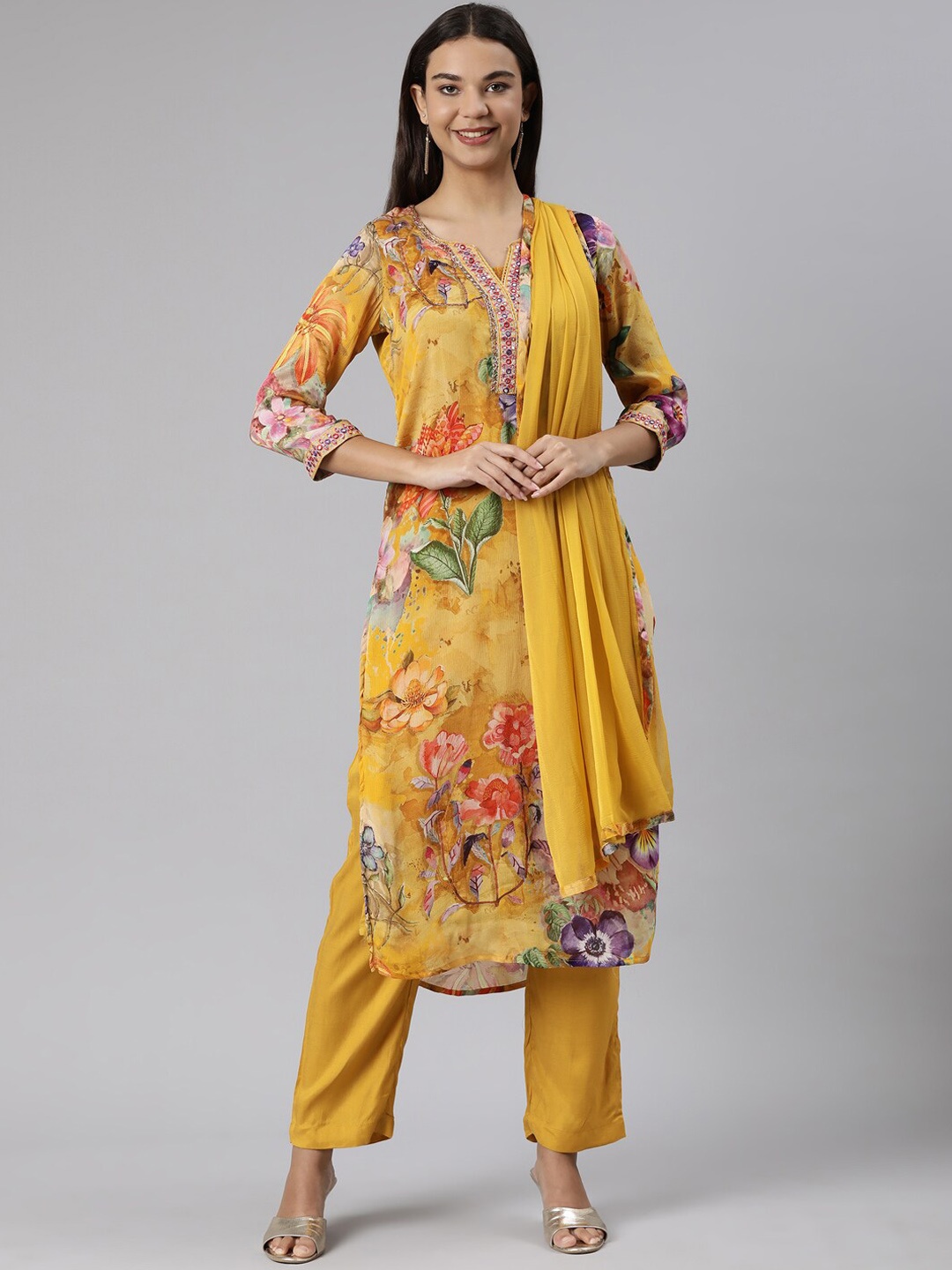 

Neerus Floral Printed Silk Chiffon Straight Kurta With Trousers & Dupatta, Mustard