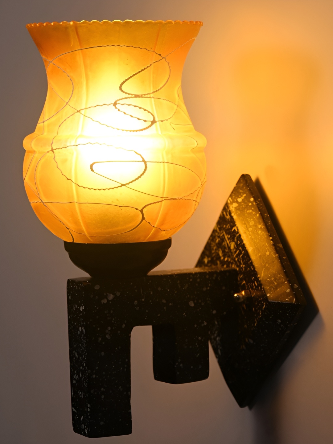 

Afast Mustard & Black Printed Abstract Shaped Glass Wall Lamp