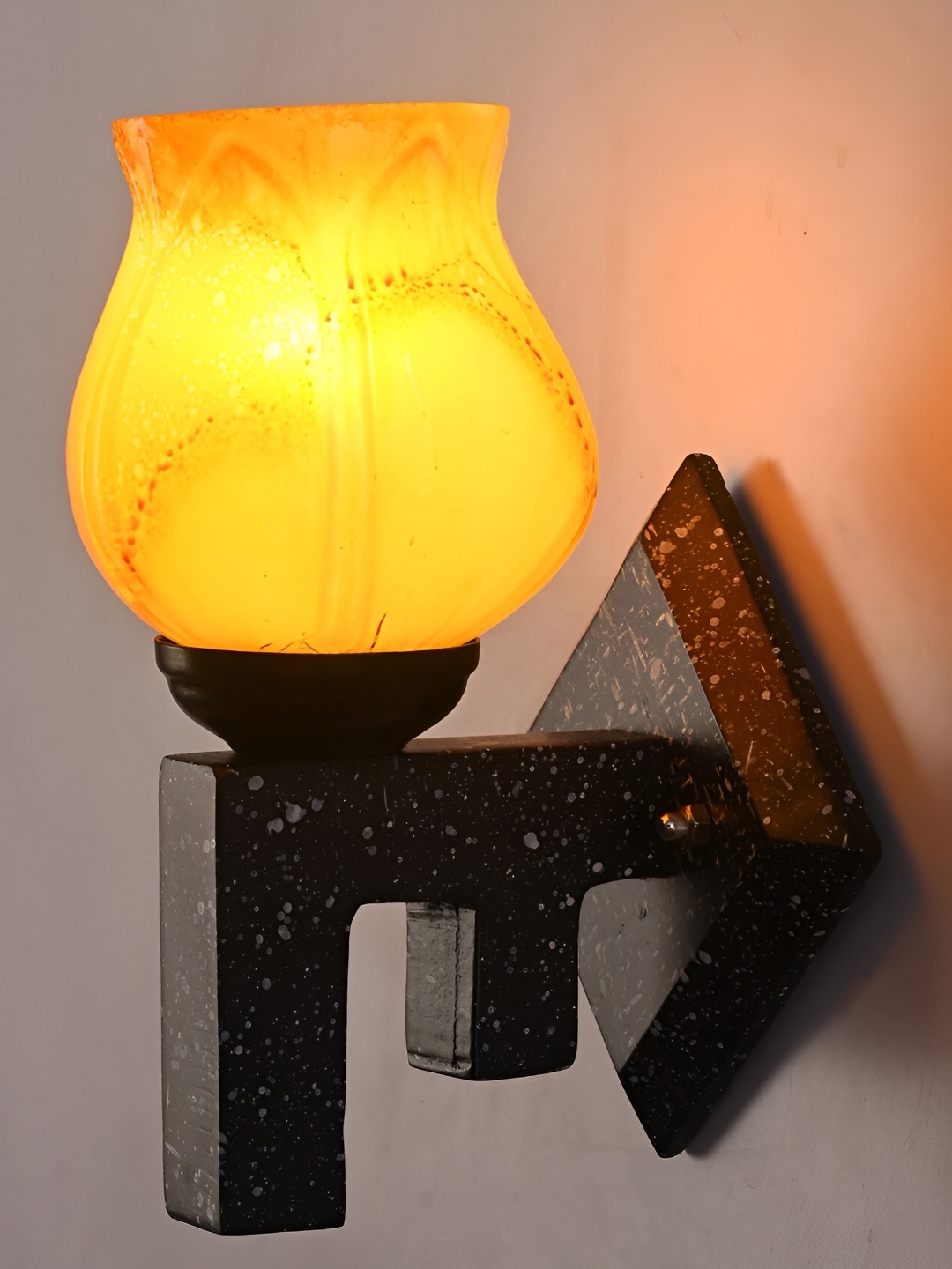 

Afast Mustard & Black Printed Abstract Shaped Glass Wall Lamp