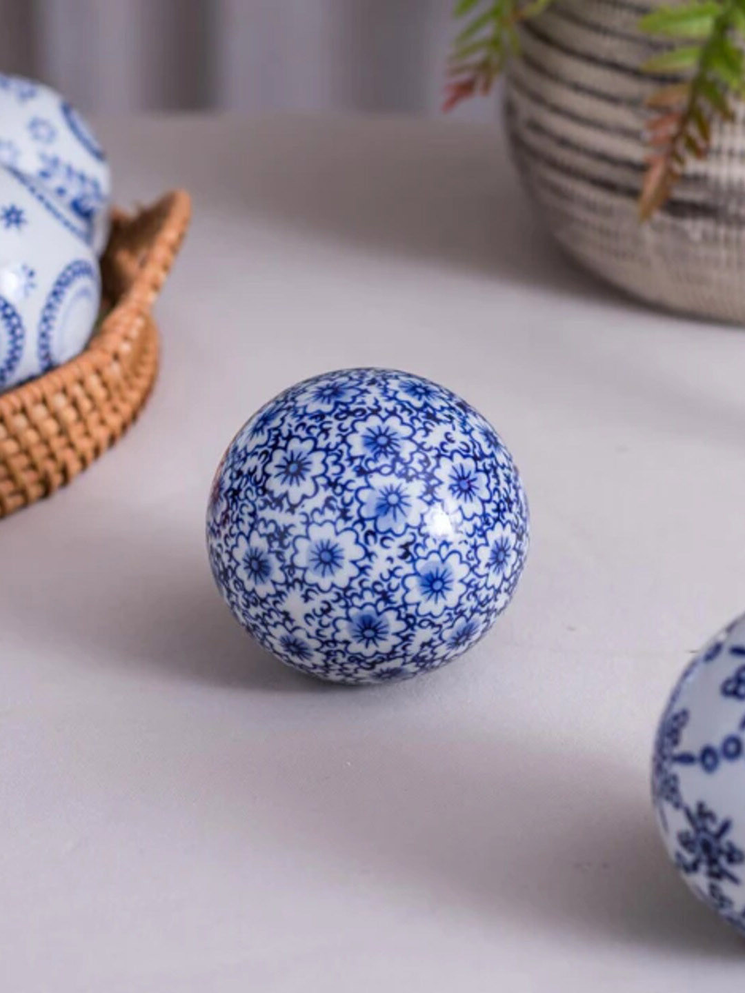 

THEDECORKART White & Blue Printed Curio Showpiece