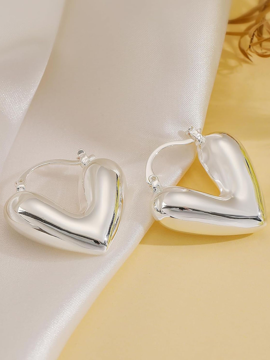 

ZIVOM Silver-Plated Anti Tarnish Heart Shaped Drop Earrings