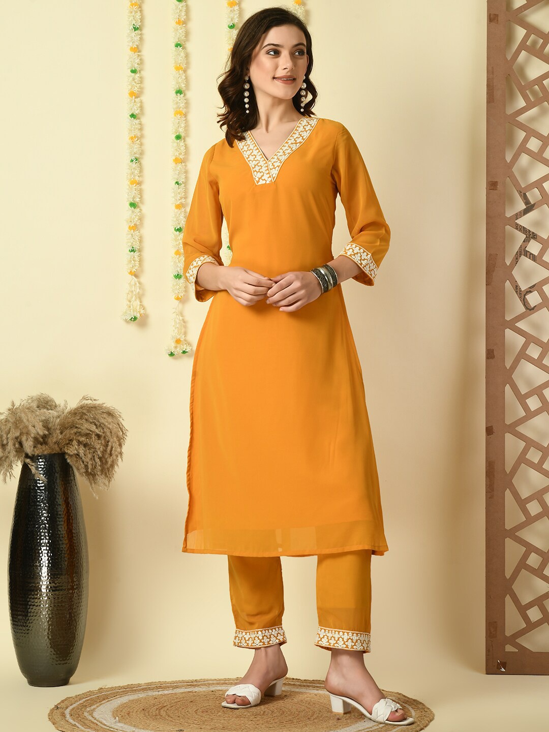 

KALINI Ethnic Motifs Yoke Design Thread Work V-Neck Georgette Kurta With Trousers, Mustard