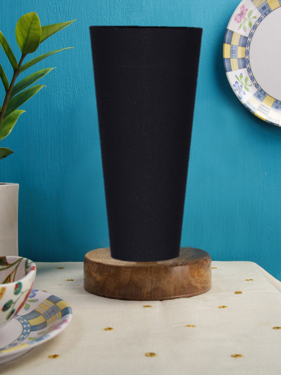 

Devansh Black and Brown cotton lamp with Natural Round wooden base Table Lamps