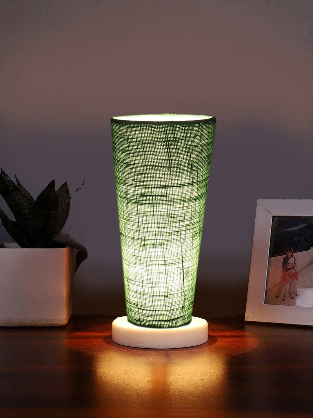 

Devansh Green Textured Wooden Cylinder Shaped Table Lamps