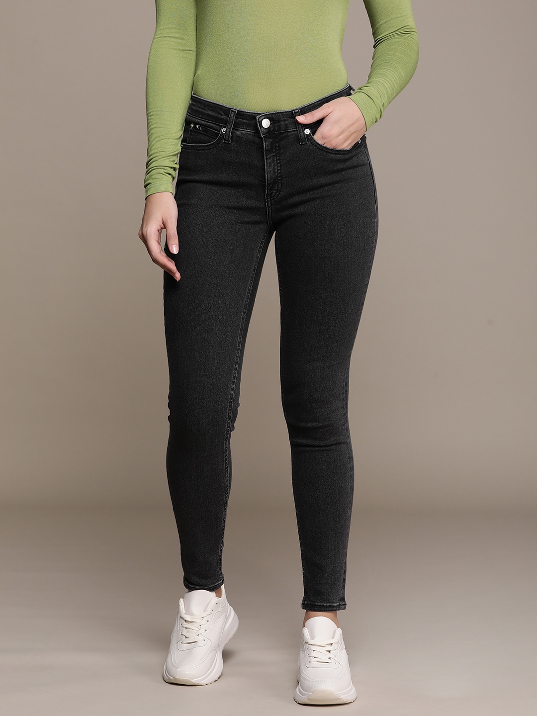 

Calvin Klein Jeans Women Skinny Fit Light Fade Stretchable Jeans, Black