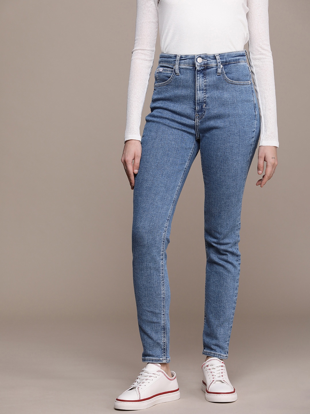 

Calvin Klein Jeans Women Bootcut High-Rise Light Fade Stretchable Jeans, Blue