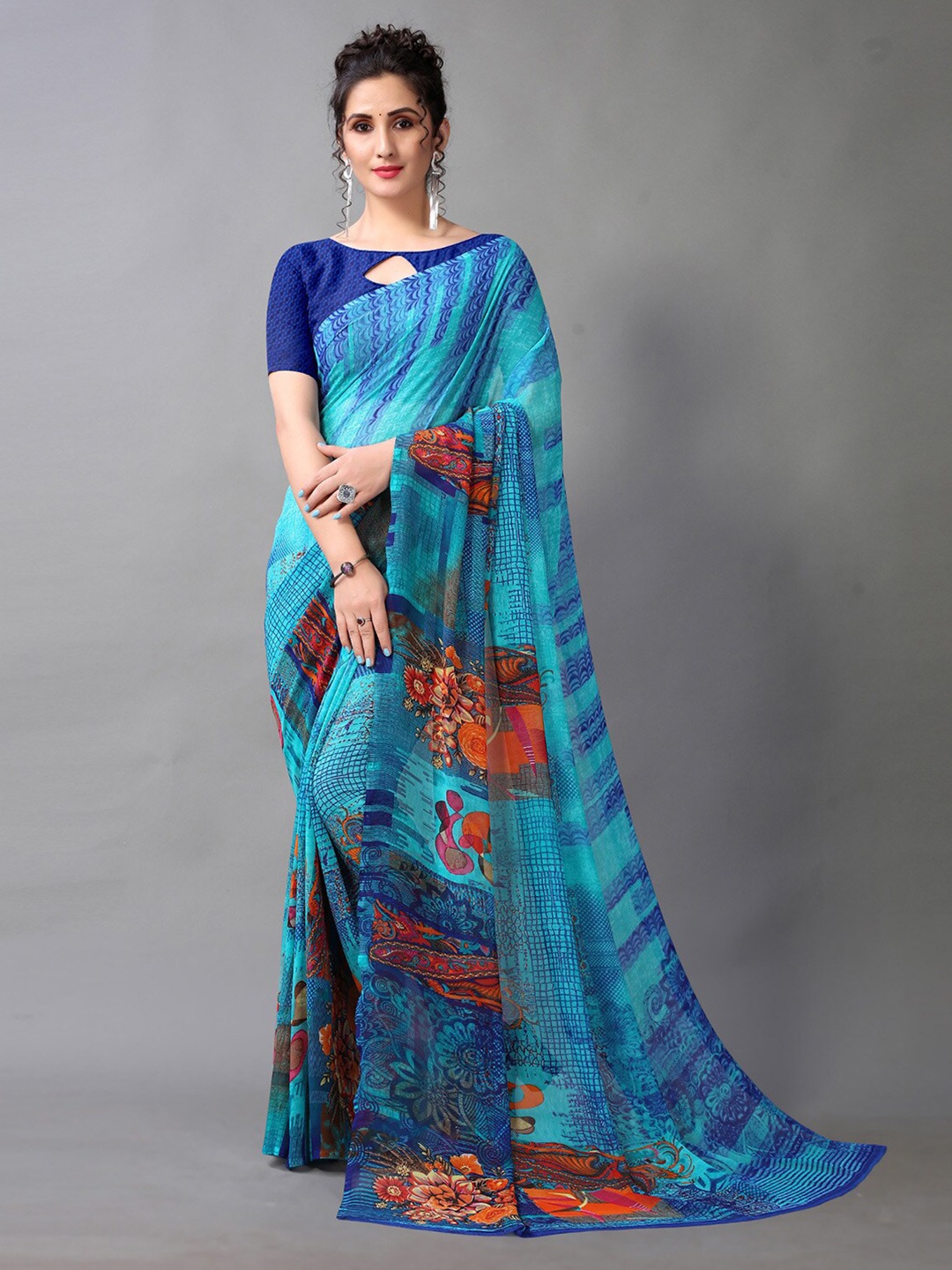 

KALINI Floral Pure Georgette Saree, Turquoise blue