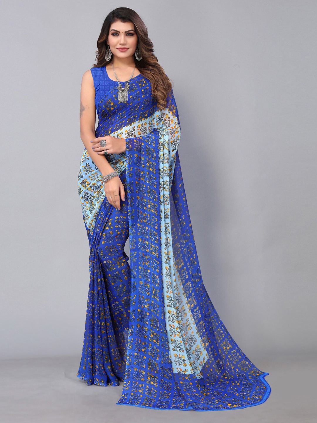

KALINI Blue and Yellow Colourblocked Ethnic Motifs Pure Georgette Printed Saree