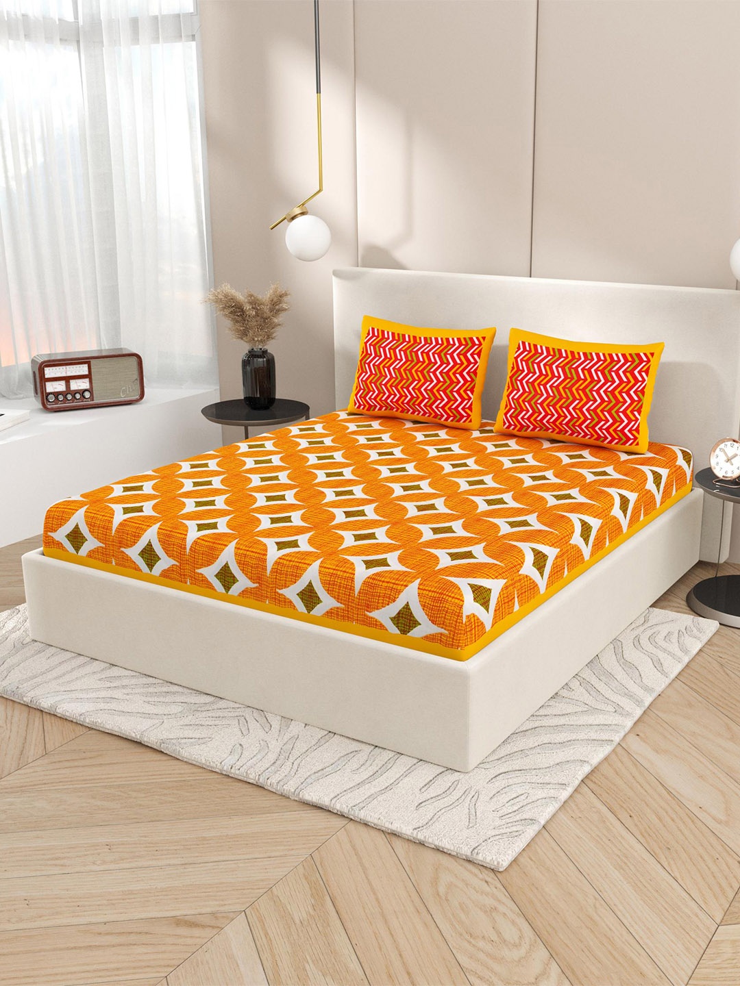 

Lali Prints Orange Geometric Printed 130 TC Queen Bedsheet with 2 Pillow Covers