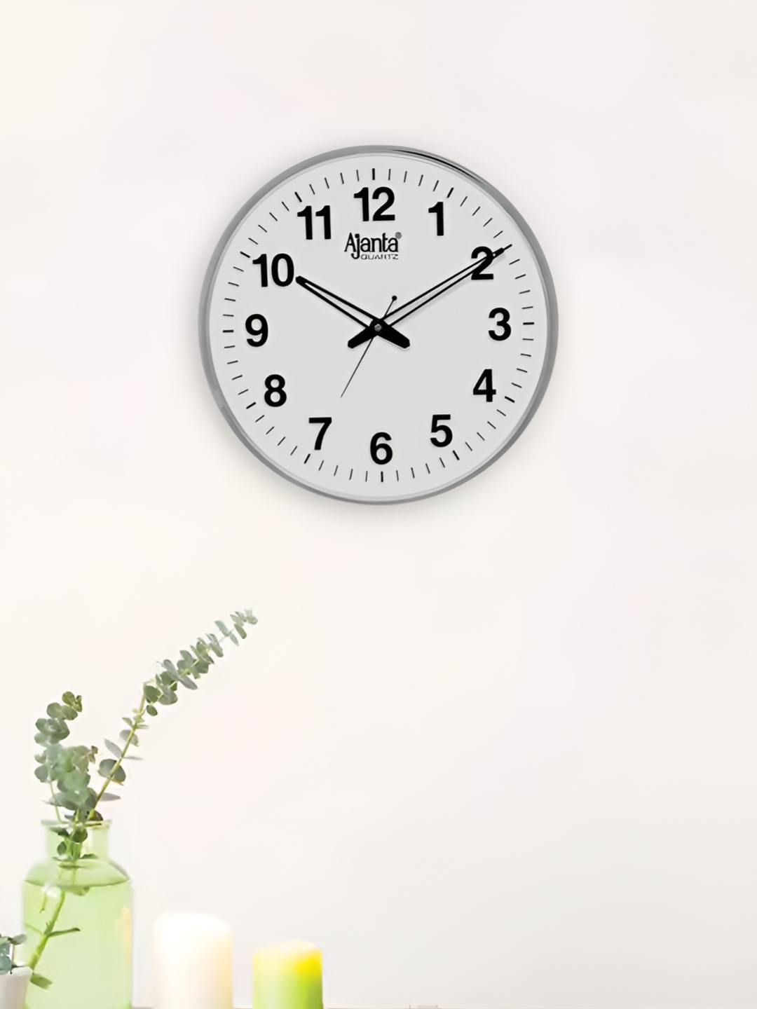 

AJANTA White and Black Analog Fashion Wall Clock