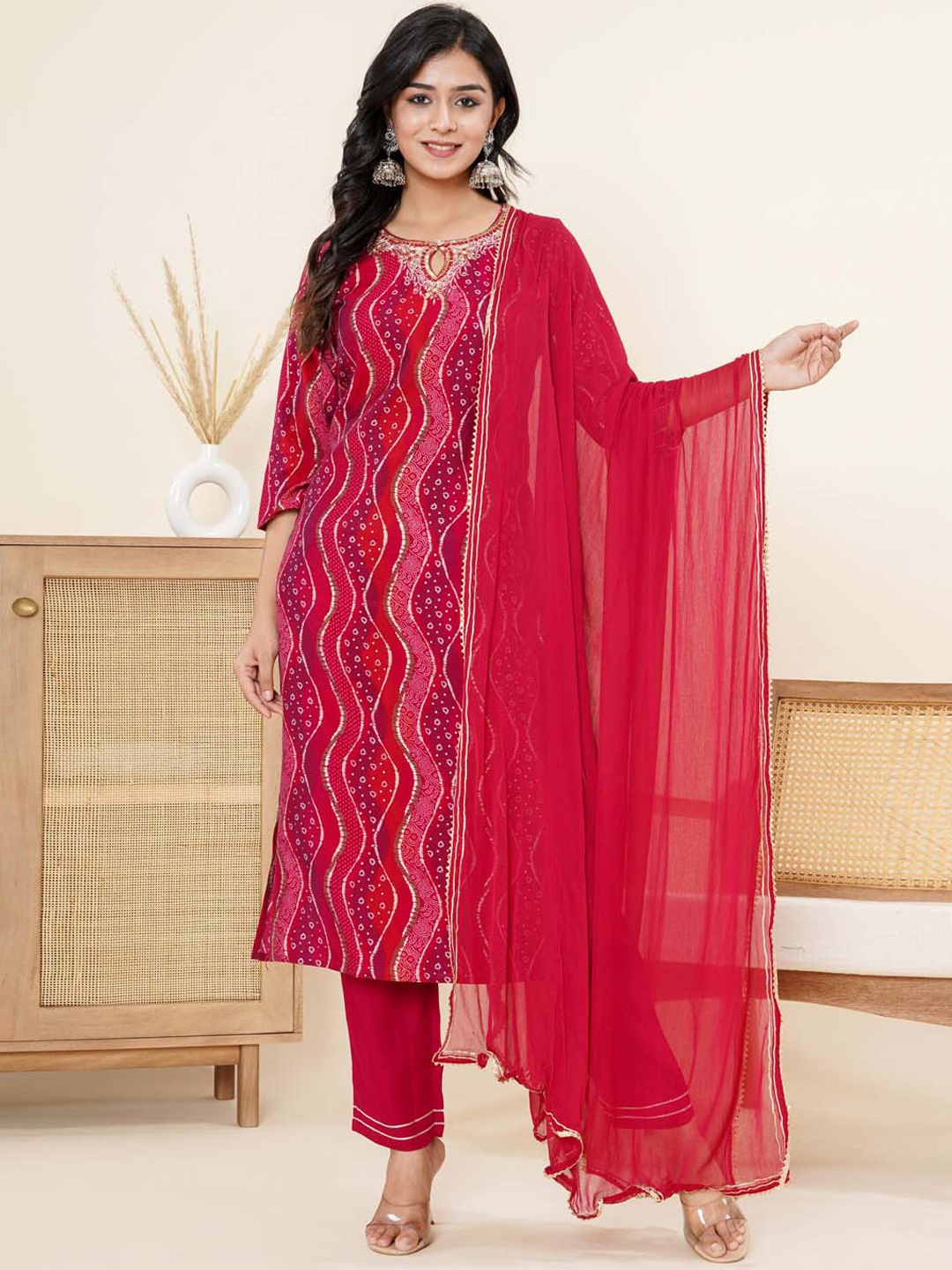 

Meena Bazaar Bandhani Printed Thread Work Kurta With Trousers & Dupatta, Pink