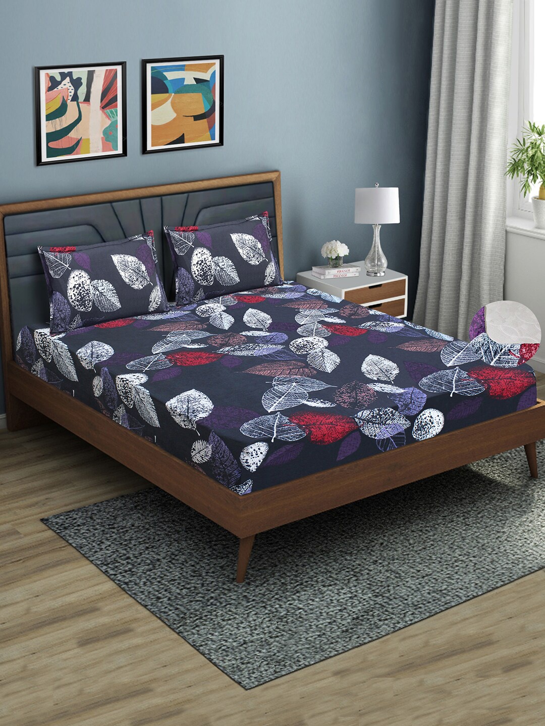 

Aura Navy Blue & White Floral 144 TC Fitted Queen Bedsheet with 2 Pillow Covers