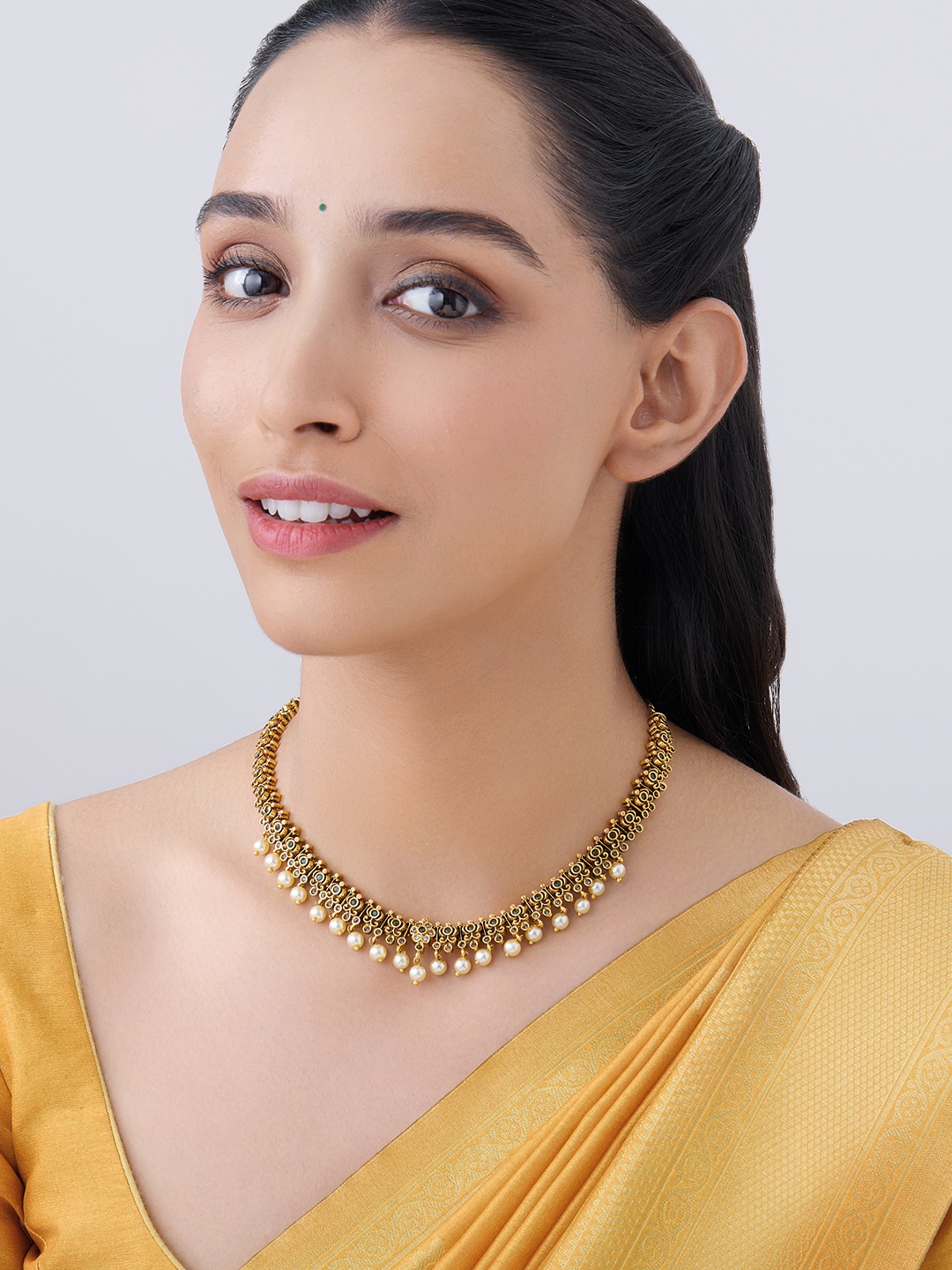 

Kushal's Fashion Jewellery Gold Plated Stone Studded & Beaded Necklace
