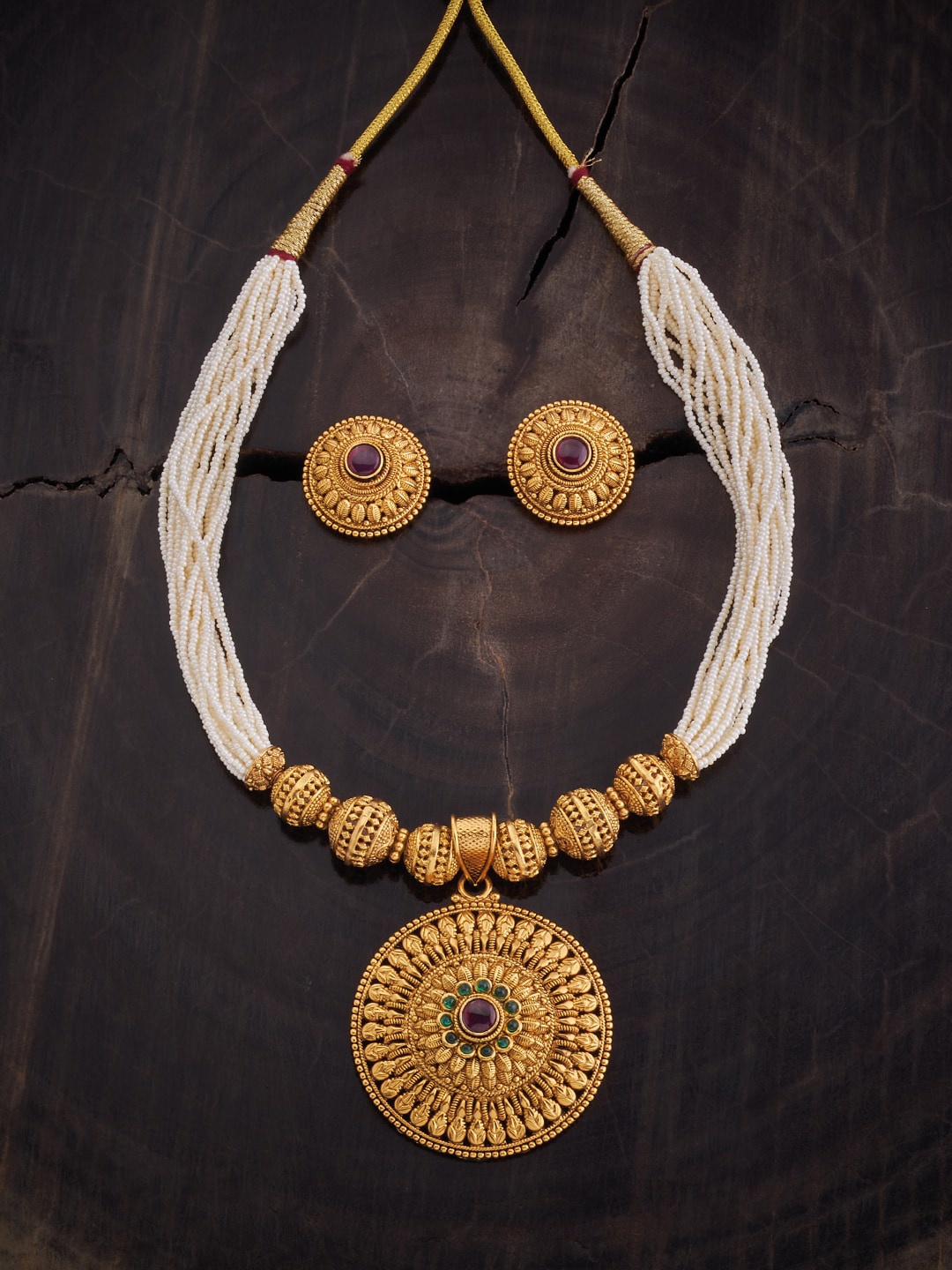 

Kushal's Fashion Jewellery Gold-Plated Stone Studded & Beaded Antique Jewellery Set