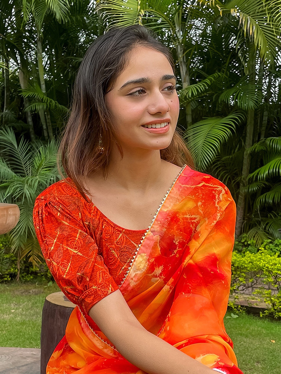

Bindigasm's Advi Floral Woven Design Puff Sleeves Jacquard Stretchable Saree Blouse, Orange