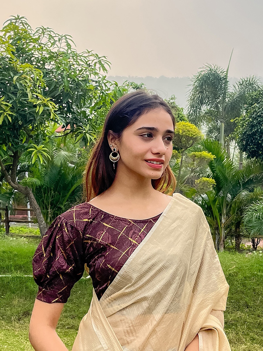 

Bindigasm's Advi Floral Woven Design Puff Sleeves Jacquard Stretchable Saree Blouse, Coffee brown