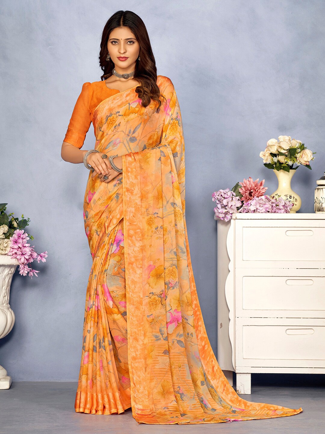 

Mitera Floral Printed Poly Chiffon Bagru Saree, Orange