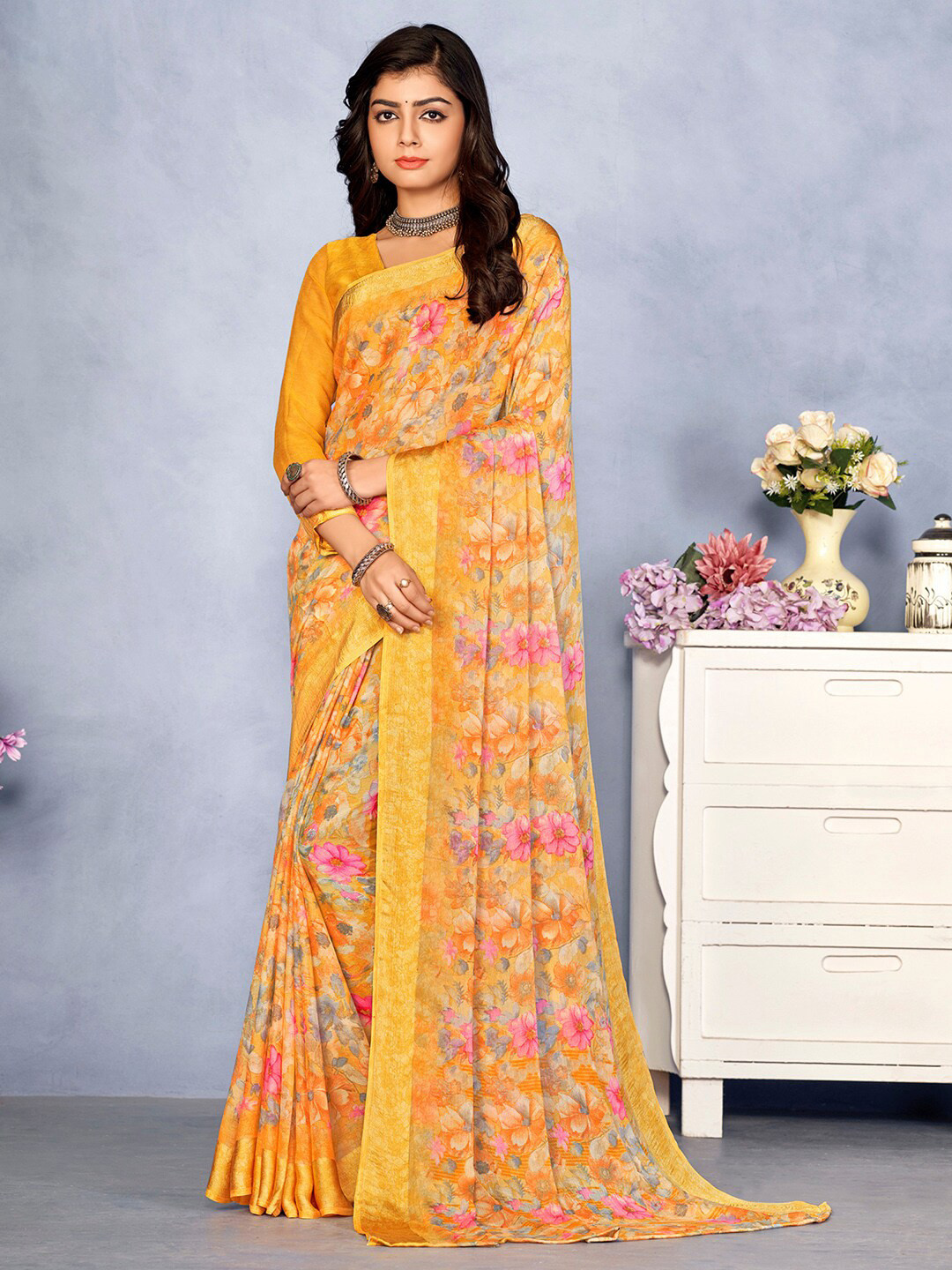 

Mitera Floral Printed Poly Chiffon Bagru Saree, Orange