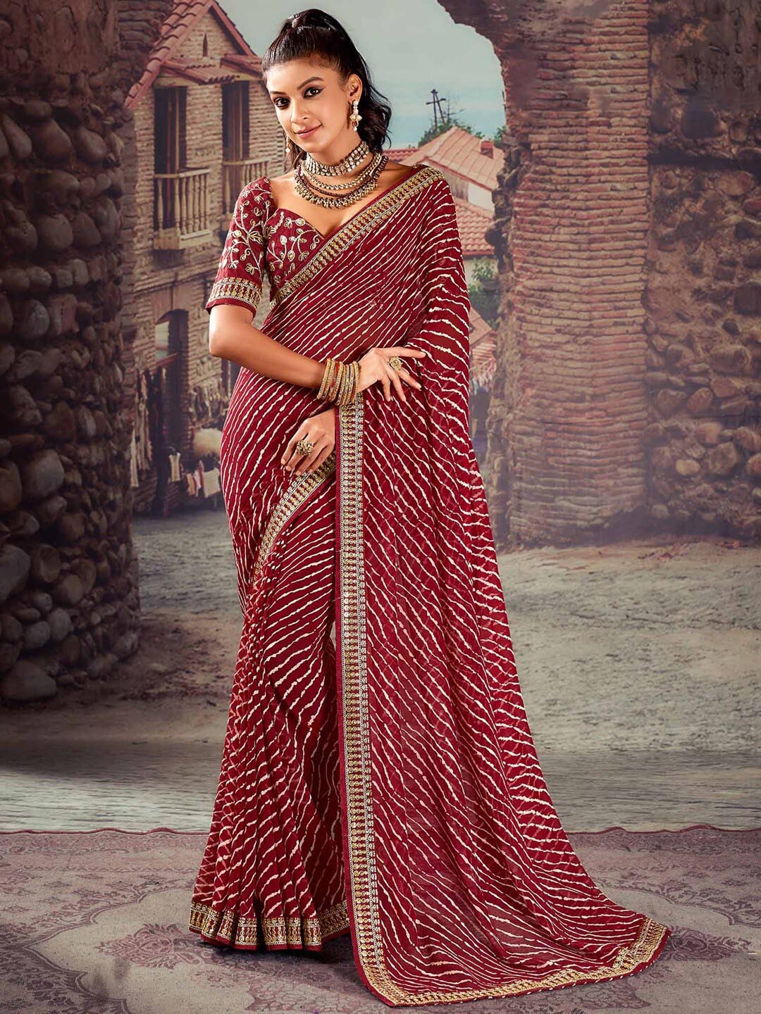 

Mitera Maroon Leheriya Sequinned Pure Georgette Designer Leheriya Saree