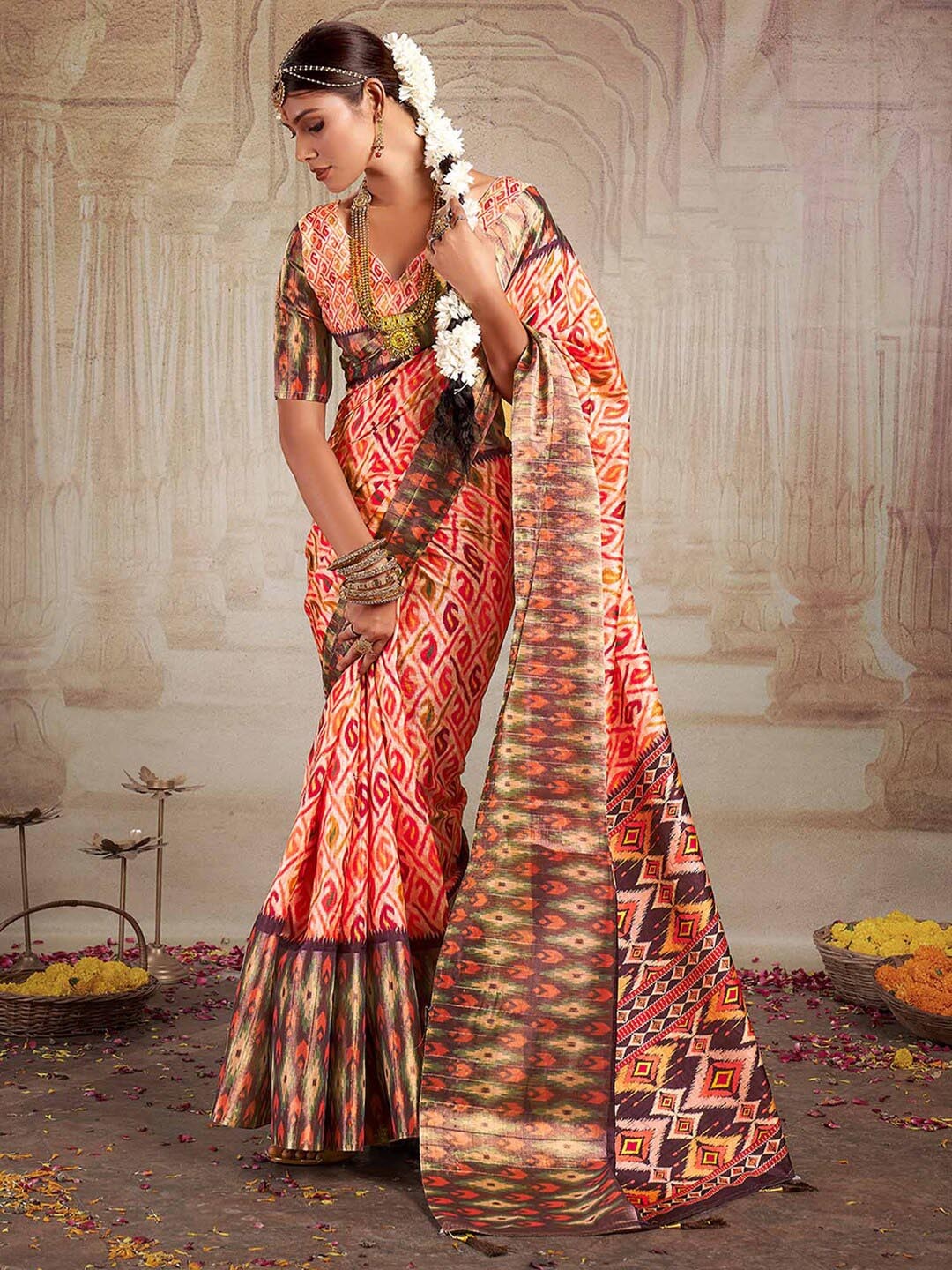 

Mitera Ethnic Motifs Printed Silk Blend Designer Ikat Saree, Orange