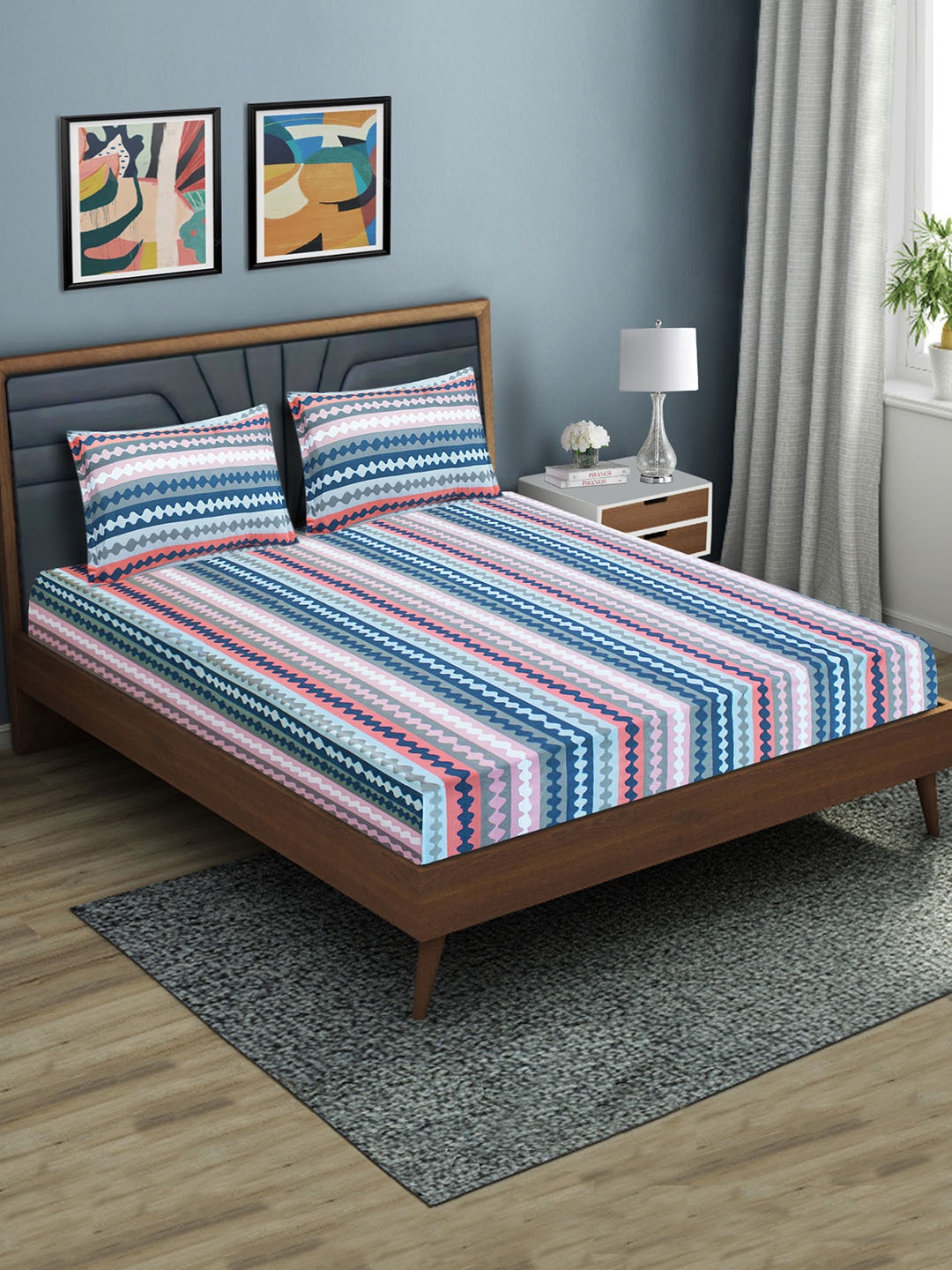 

Aura Blue Grey Printed Fitted 144 TC Queen Bedsheet With 2 Pillow Covers