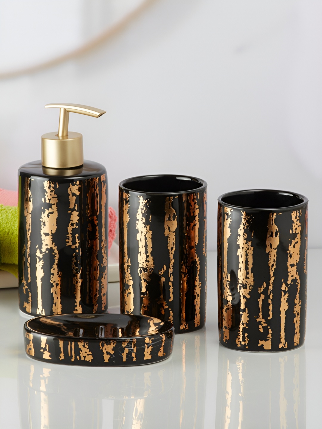 

Kookee Black & Copper Toned 4 Pieces Cylindrical Shaped Ceramic Bath Accessories Set