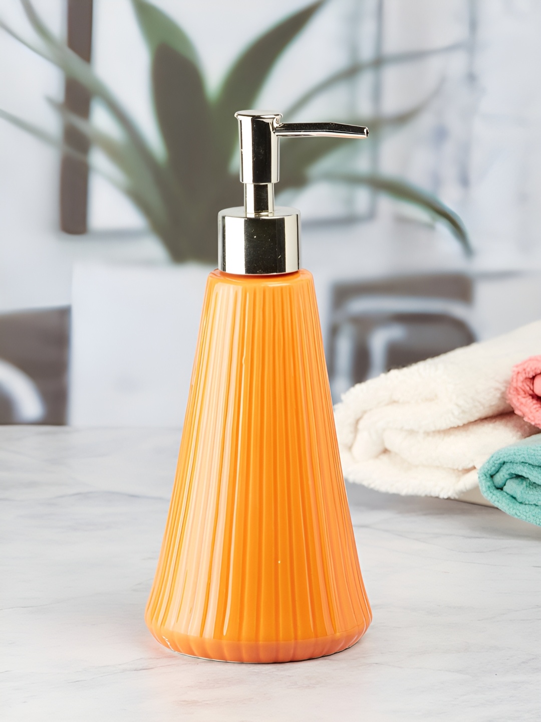 

Kookee Orange Glossy Striped Ceramic Soap Dispenser