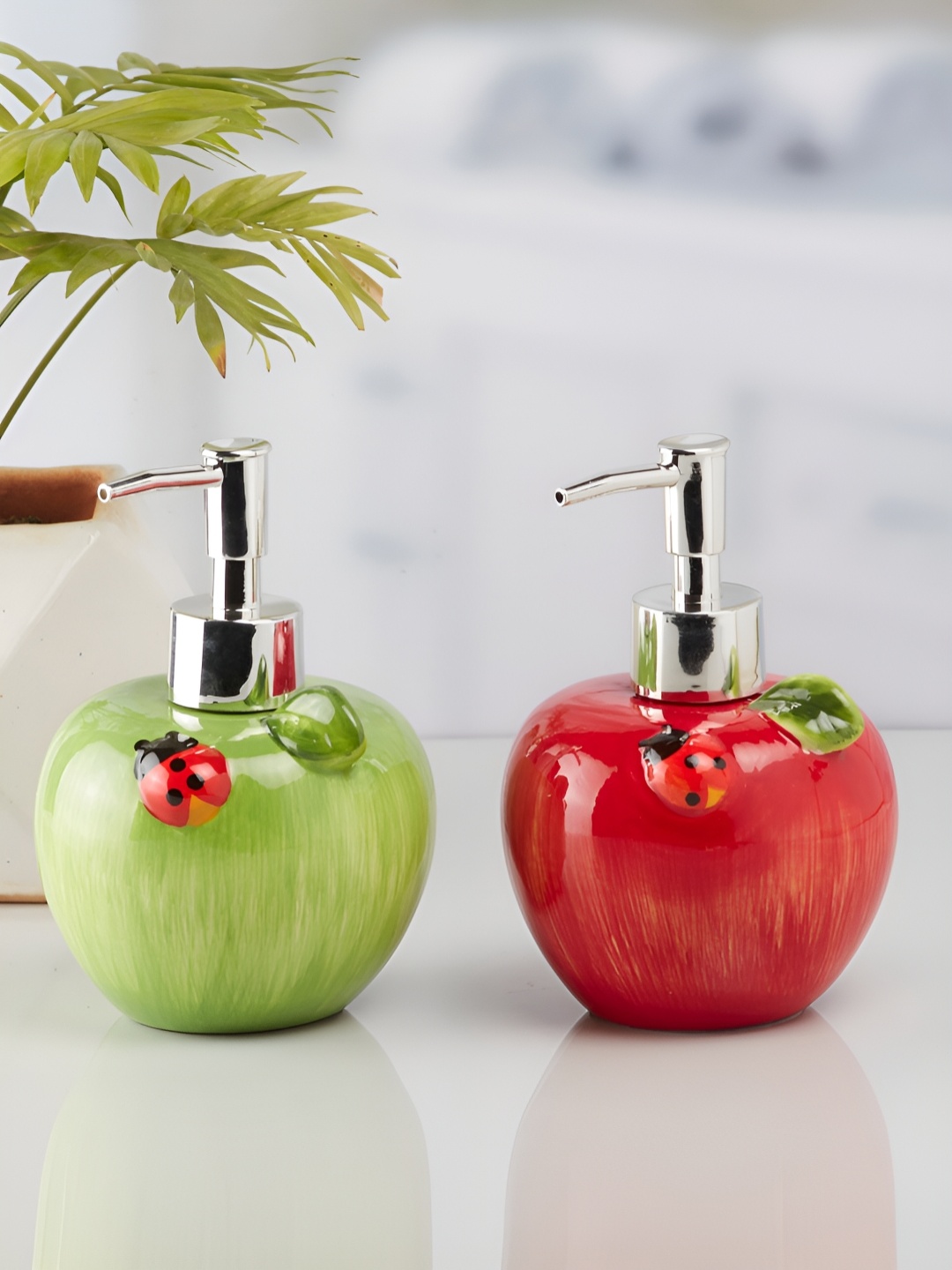 

Kookee Green & Red 2 Pieces Abstract Ceramic Soap Dispensers