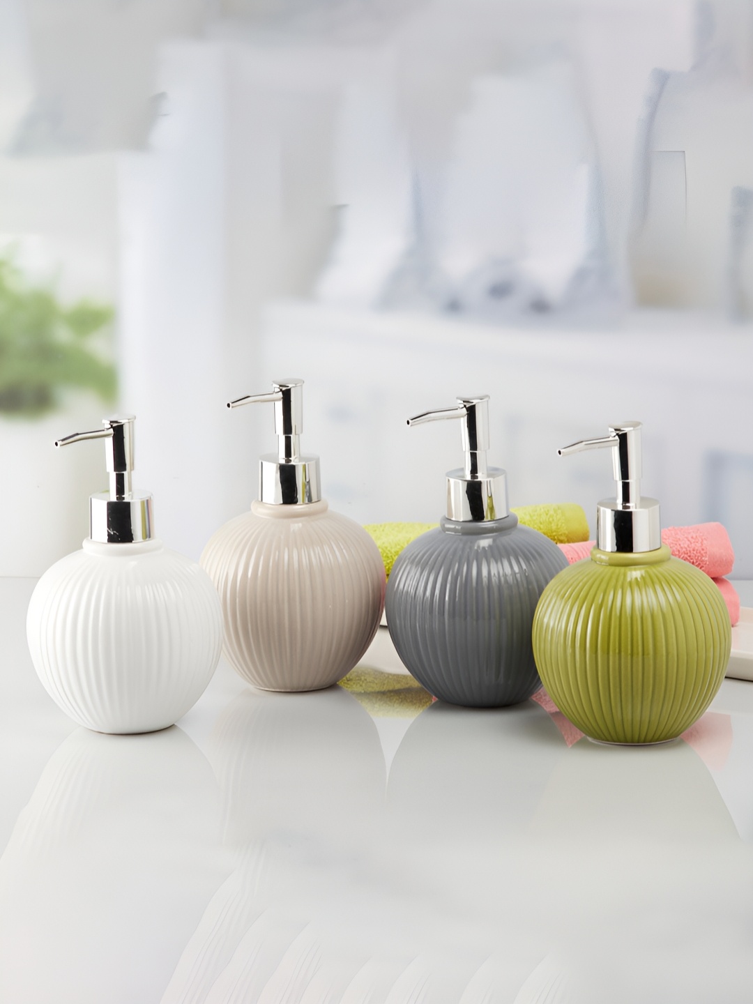 

Kookee White 4 piece Textured Ceramic Soap Dispenser