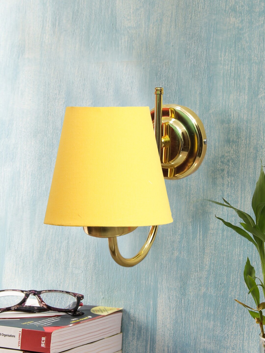 

Devansh Yellow & Gold-Toned Textured Contemporary Metal Frustum Wall Lamp