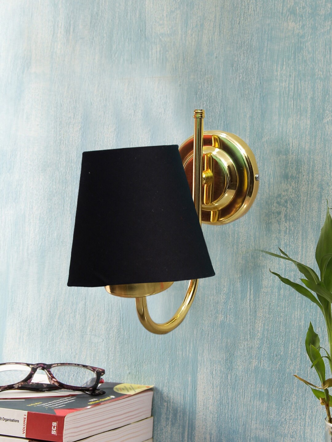 

Devansh Black & Gold-Toned Textured Contemporary Metal Frustum Wall Lamp