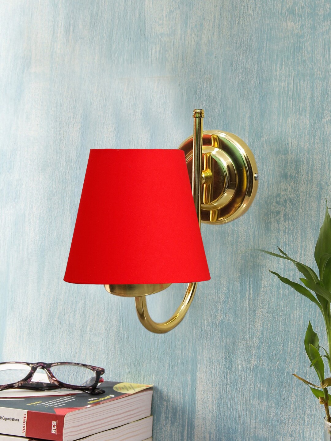 

Devansh Red & Gold Toned Textured Frustum Shaped Cotton Wall Lamp