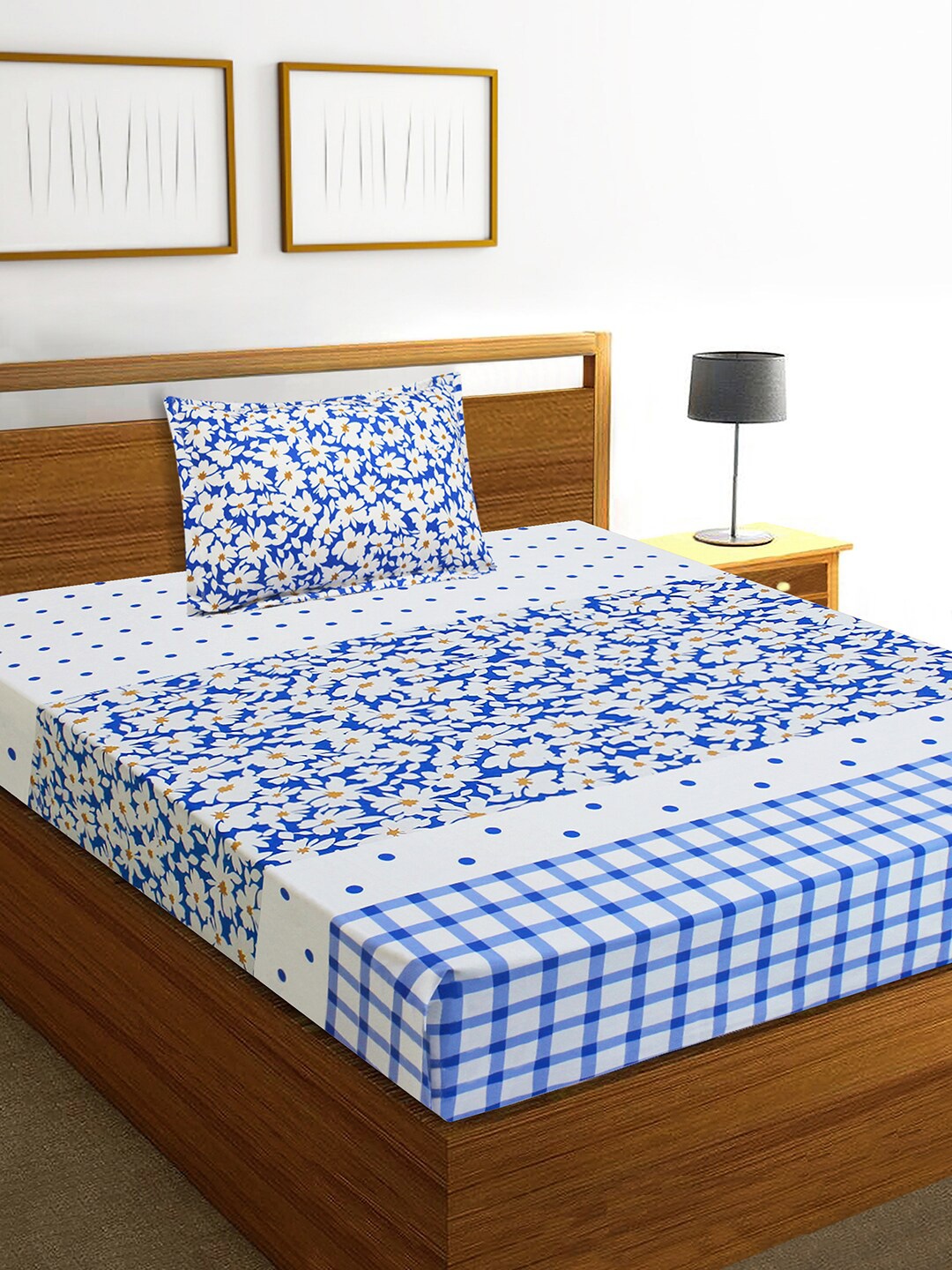 

Aura White & Blue Floral Printed 160 TC Single Bedsheet with 1 Pillow Covers