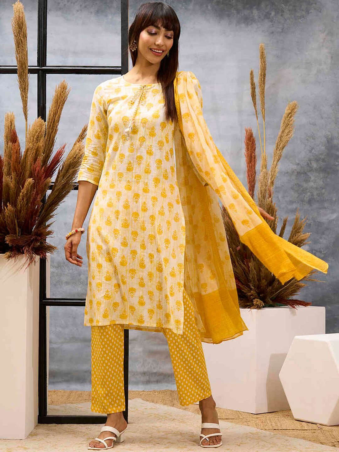 

ZOLA Yellow Floral Printed Tie Up Neck Pure Cotton Kurta with Trousers & Dupatta