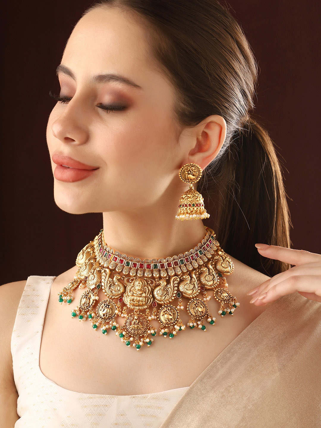 

Priyaasi Gold-Plated Stones-Studded & Beaded Jewellery Set