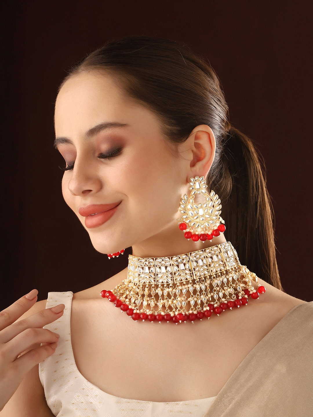 

Priyaasi Gold-Plated Kundan Stone Studded Jewellery Set