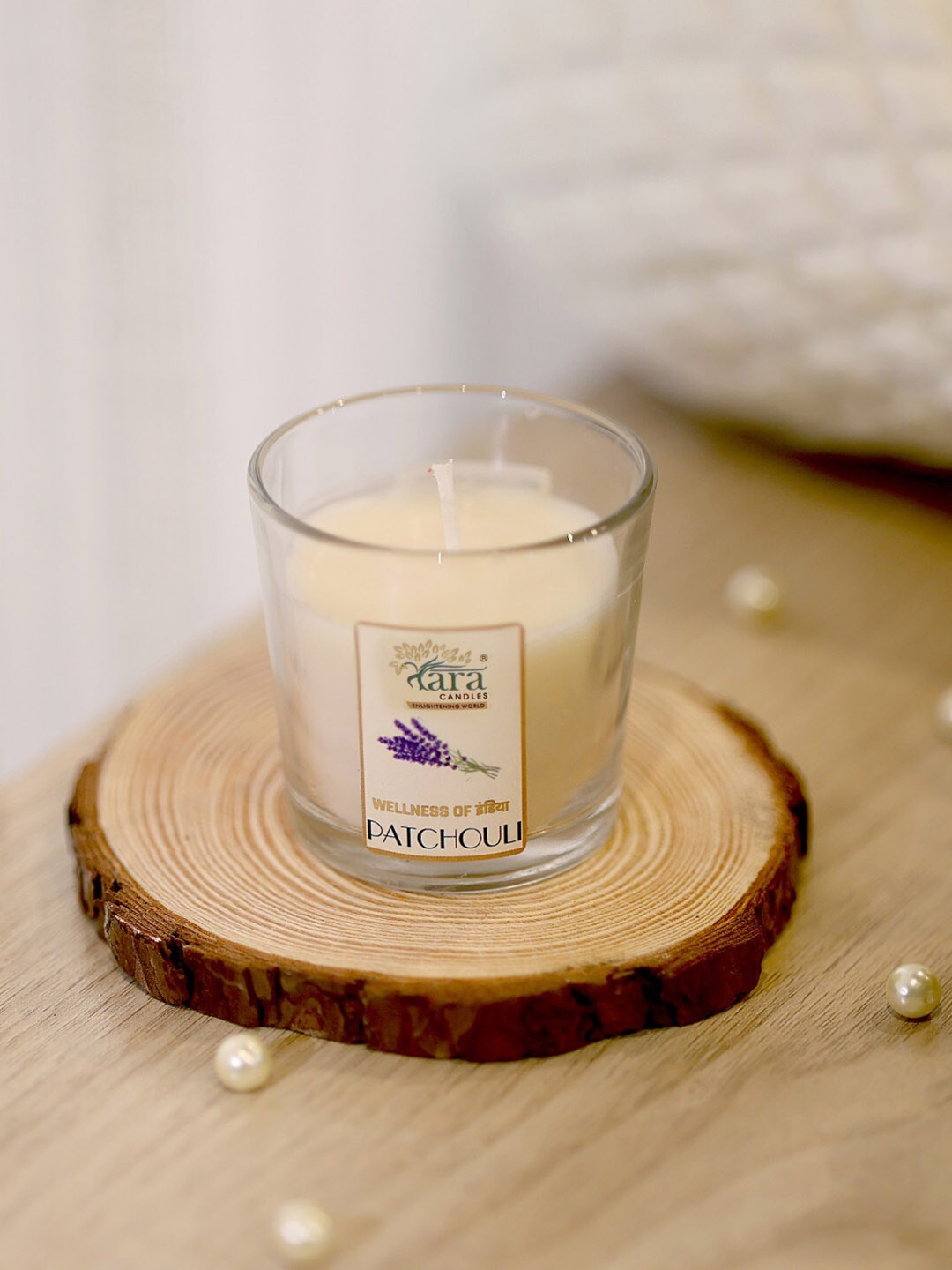 

Tara Enlightening World Patchouli Votive Candle, Off white