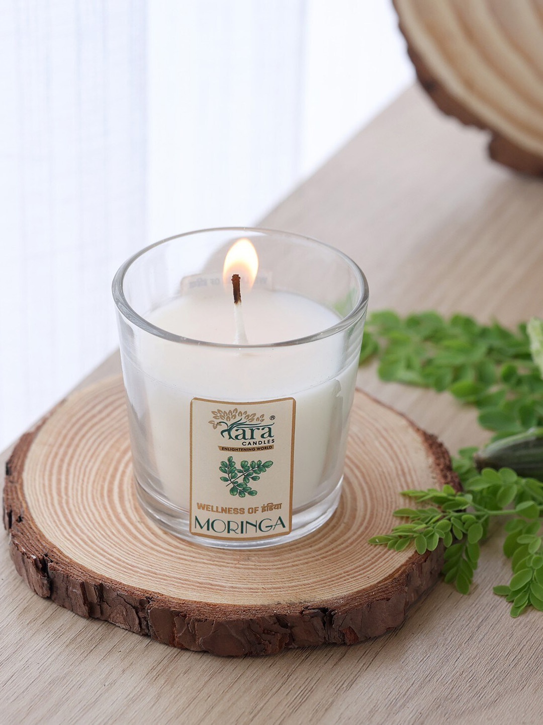 

Tara Enlightening World Moringa Votive Scented Candle, Off white