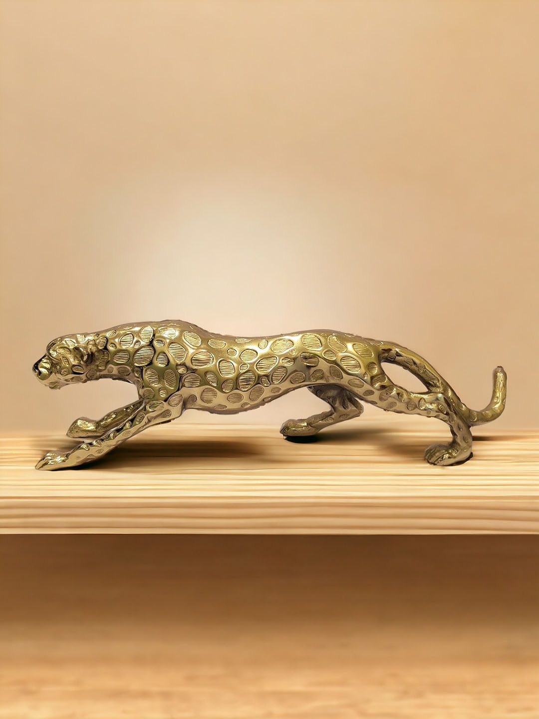 

The Artage Gold Toned Metal Showpiece