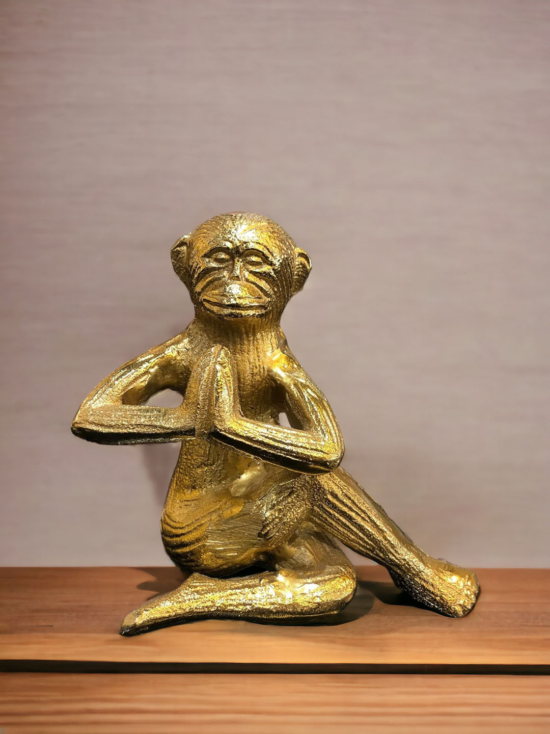 

The Artage Gold Toned Aasan Monkey Showpiece