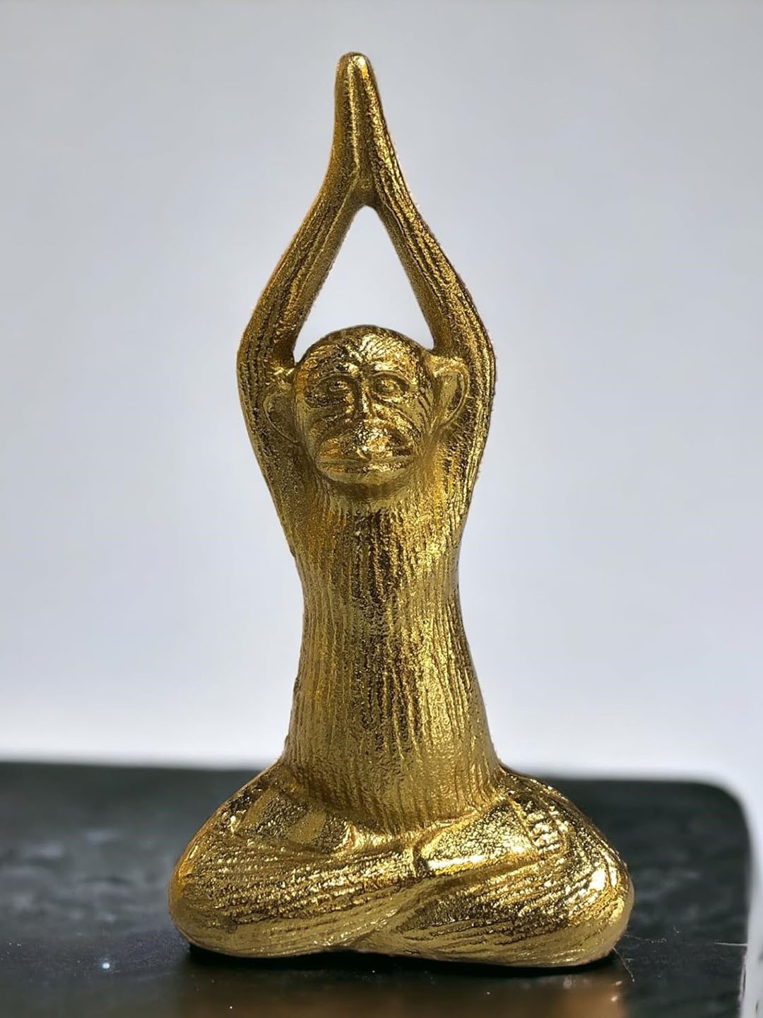 

The Artage Gold Toned Idol Namaskar Monkey Showpiece