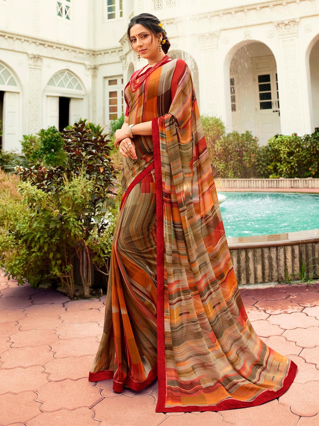

Civamee Striped Georgette Designer Saree, Rust