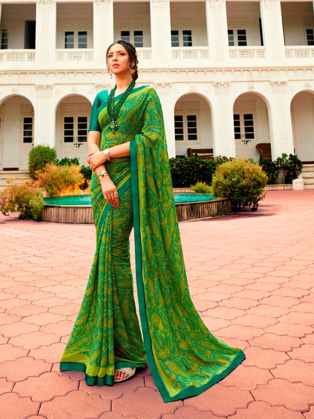 

Civamee Floral Poly Georgette Designer Saree, Green